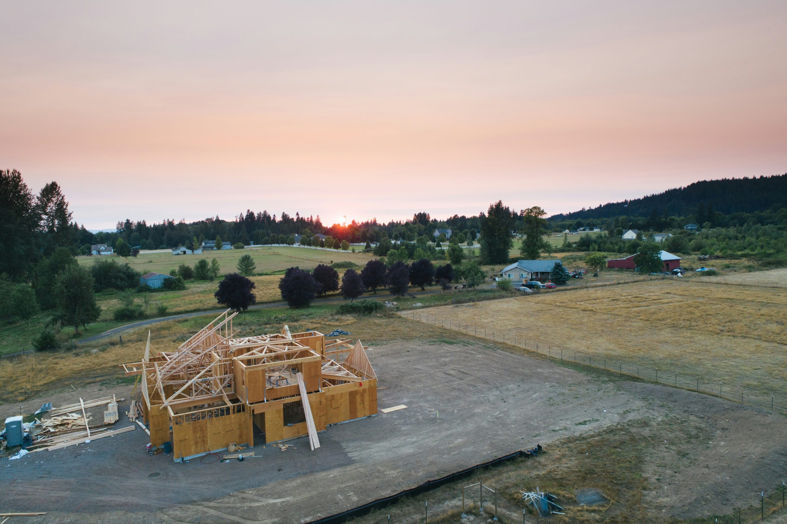 Custom Acreage Home being built and showing construction of the frame stage